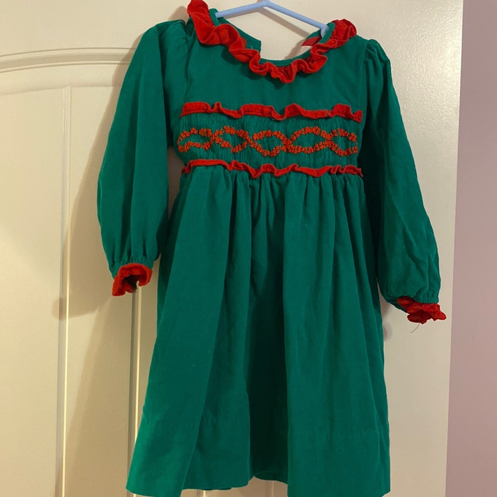 Cute cord smocked dress worn a couple of times last season! Adorable on!